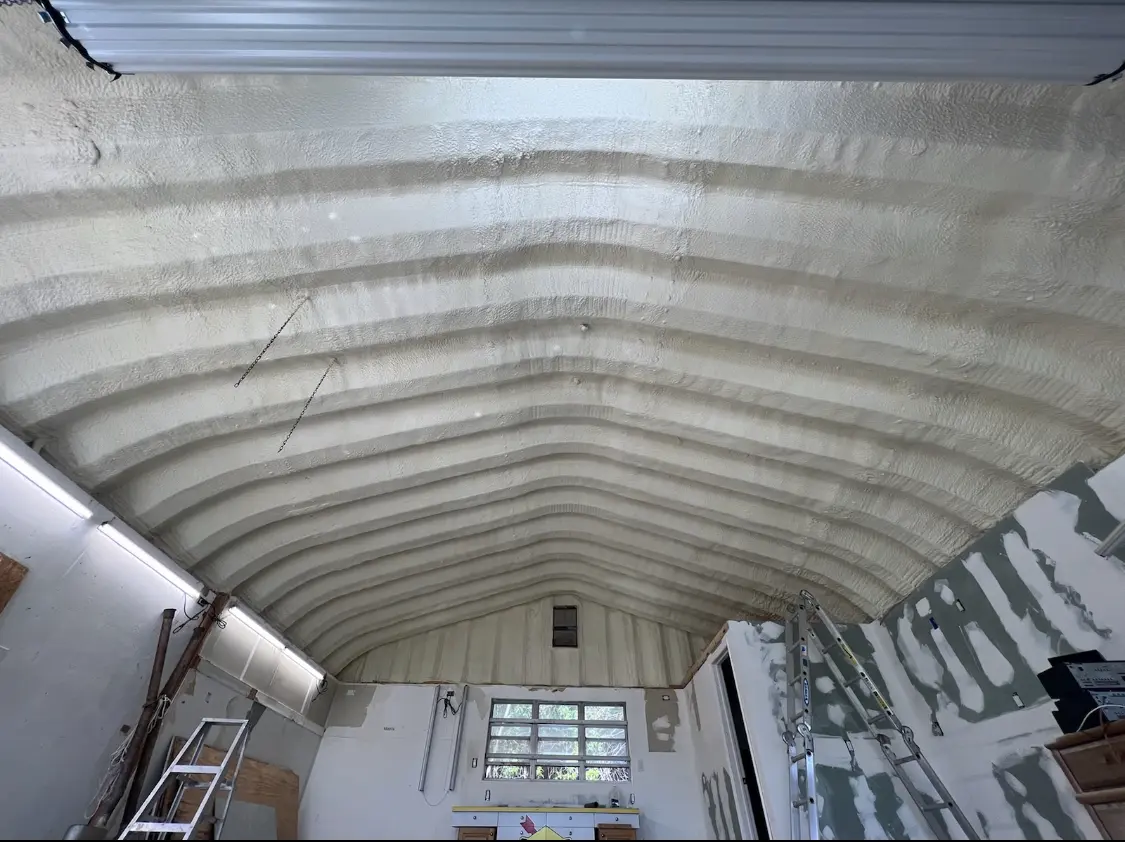 Spray polyurethane foam applied to the underside of a metal roof deck in Nevada